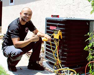 Lead Install Technician, Gilbert Caceres installing a new HVAC system in Antioch, CA