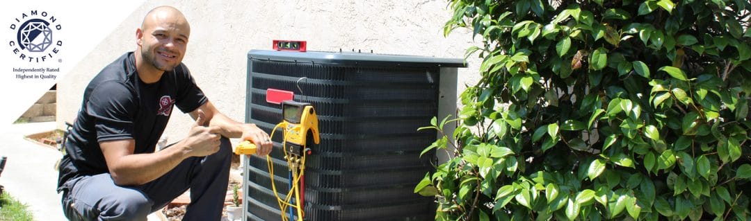 Owner, Chris Donzelli servicing a client’s air conditioning unit in Brentwood, CA